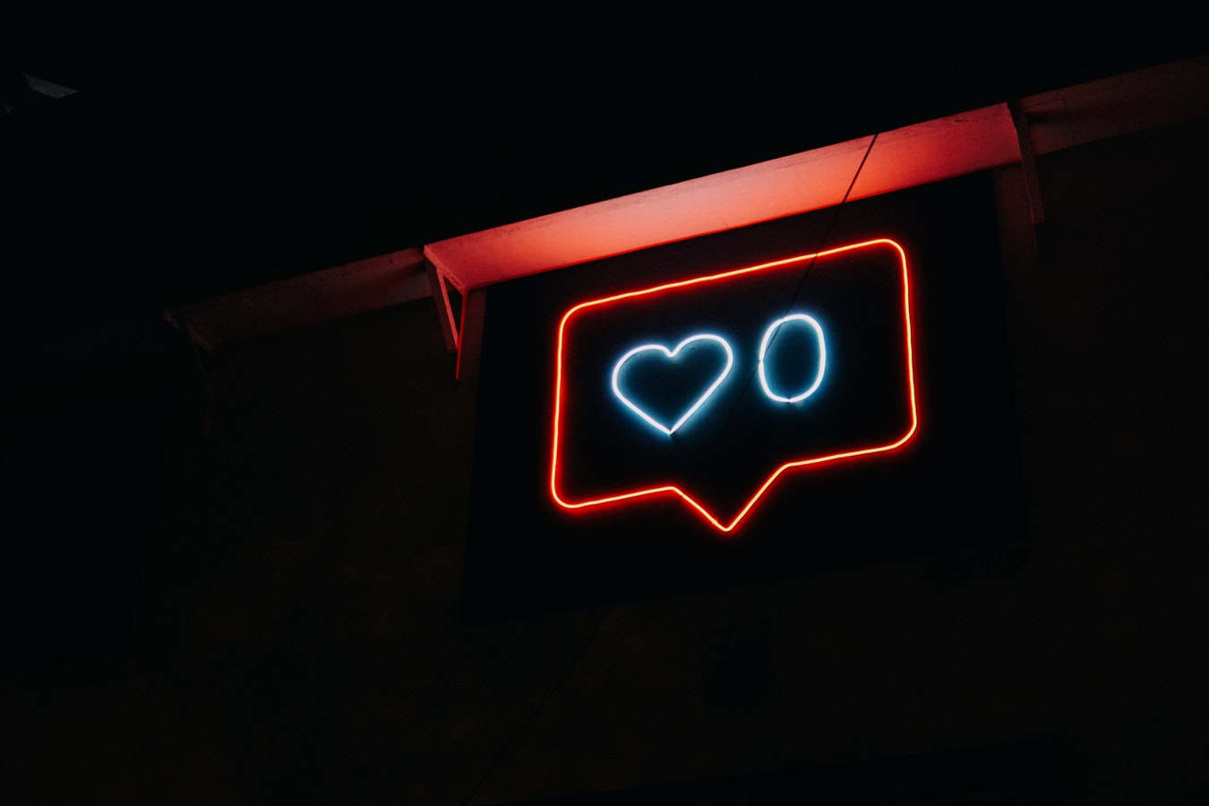 Neon post showing social media likes as zero
