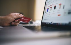 Man holding credit card for online shopping